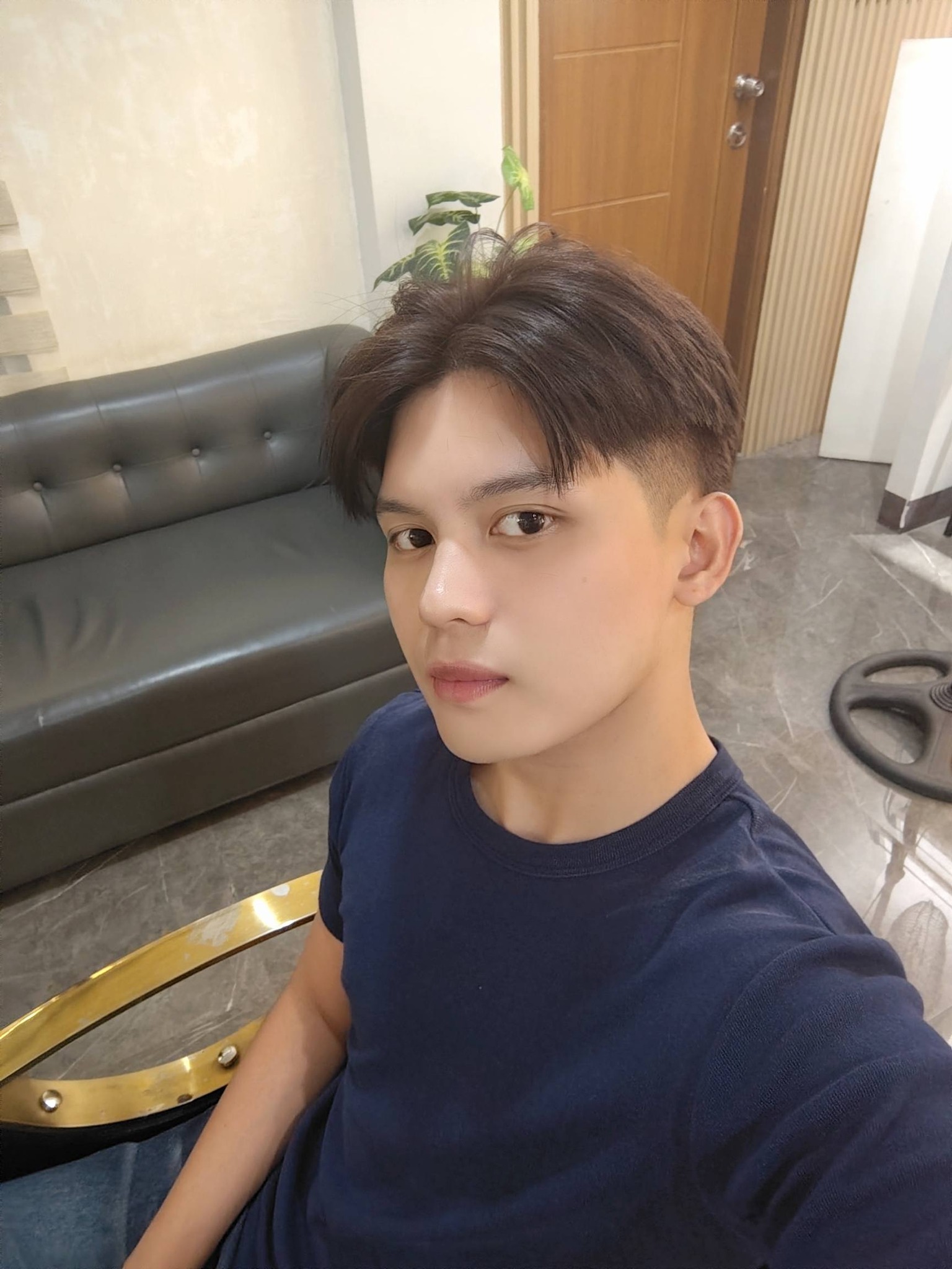 Men's haircut service at Elitista Salon